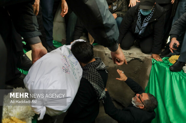 Bodies of 2 Holy Defense martyrs buried in interior ministry
