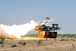 Syrian air defense confronts Zionists' aggression on Damascus