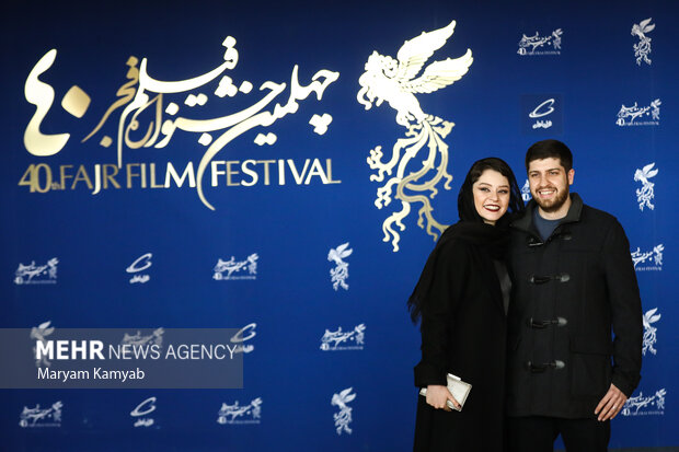 آرین وزیر دفتری کارگردان به همراه همسر خود شادی کرم رودی بازیگر در مراسم پیش از اکران فیلم بی رویا در هشتمین روز جشنواره فیلم فجر حضور دارند