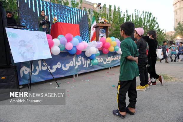 Children of Tehran attend public Iftar ceremony