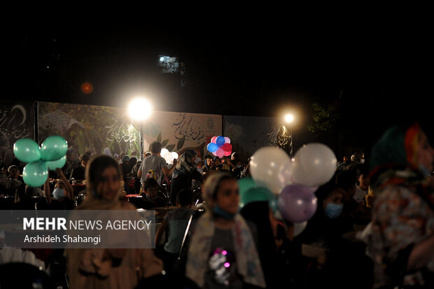 Children of Tehran attend public Iftar ceremony