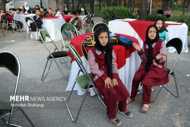 Children of Tehran attend public Iftar ceremony