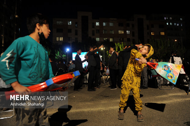 Children of Tehran attend public Iftar ceremony