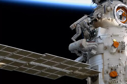 Russian cosmonauts to activate space station new robotic arm