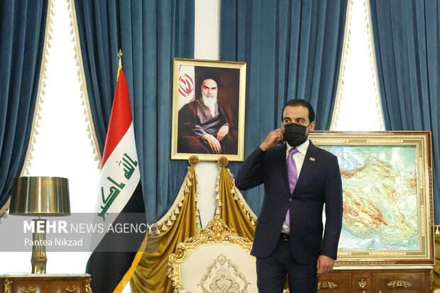 دیدار رییس پارلمان عراق با علی شمخانی