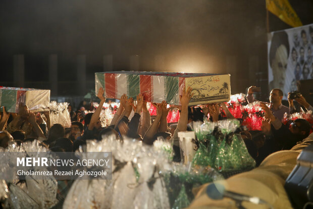 مراسم وداع با هشت شهید گمنام دفاع مقدس در ساری