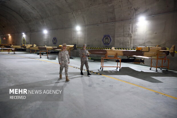 Iranian defense officials visit secret UAV base
