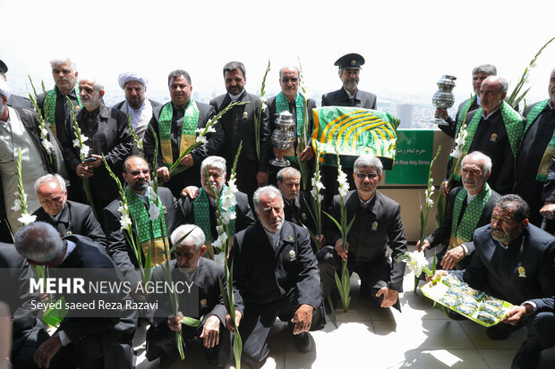 Flag of Imam Reza (PBUH) holy shrine installed at Milad Tower