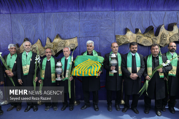 Flag of Imam Reza (PBUH) holy shrine installed at Milad Tower