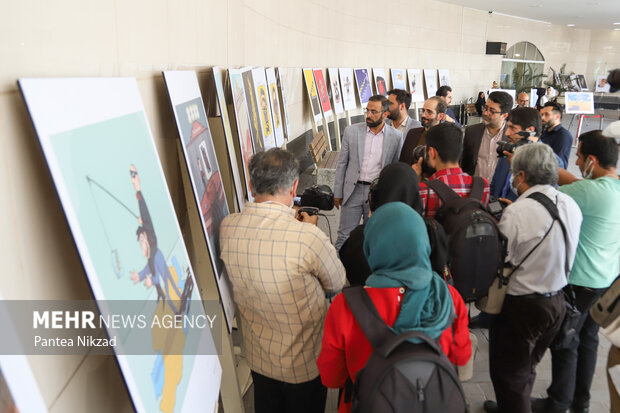 نمایشگاه کاریکاتور کن از نمای نزدیک عصر دوشنبه در ایوان انتظار میدان ولیعصر(عج)  افتتاح شد