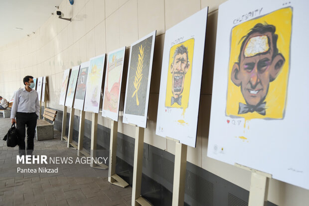 نمایشگاه کاریکاتور کن از نمای نزدیک عصر دوشنبه در ایوان انتظار میدان ولیعصر (عج) افتتاح شد