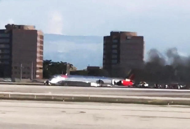 Passenger plane catches fire after landing at Miami Airport