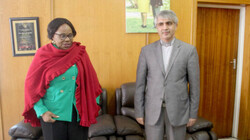 Zimbabwean Information, Publicity and Broadcasting Services Minister Monica Mutsvangwa (L) speaks with Iranian Ambassador to Zimbabwe Abbas Navazani in Harare on Wednesday.