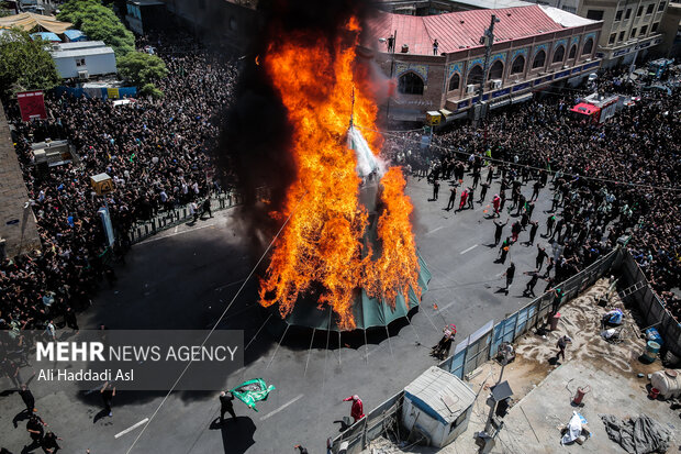 Tent-burning ceremony in Ashura in Tehran Bazaar