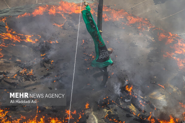 Tent-burning ceremony in Ashura in Tehran Bazaar