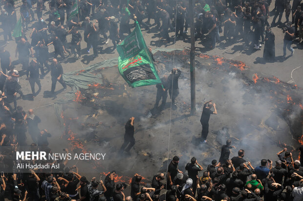 Tent-burning ceremony in Ashura in Tehran Bazaar