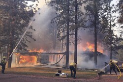 N California wildfire destroys 100 homes, injured dozen