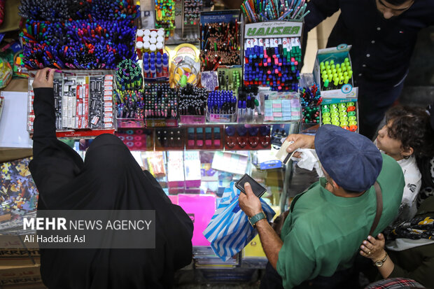 Busy market of stationery on eve of New School Year