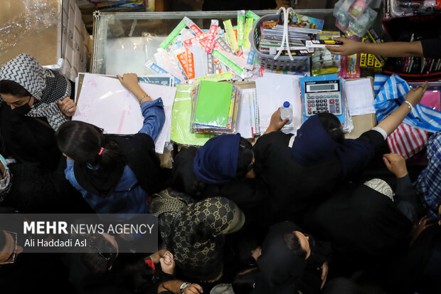 Busy market of stationery on eve of New School Year