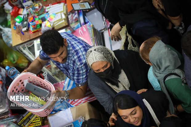 Busy market of stationery on eve of New School Year