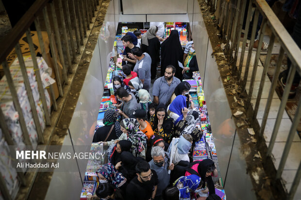 Busy market of stationery on eve of New School Year