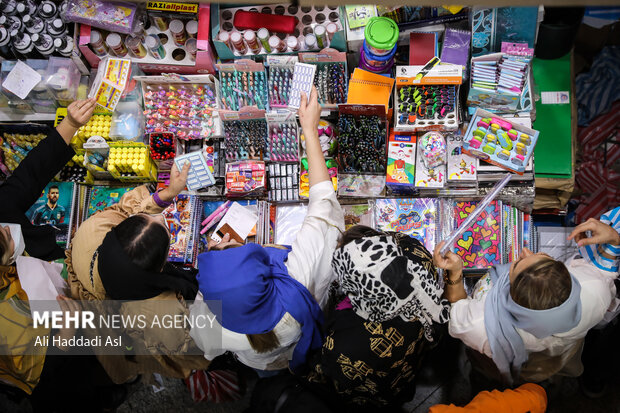 Busy market of stationery on eve of New School Year