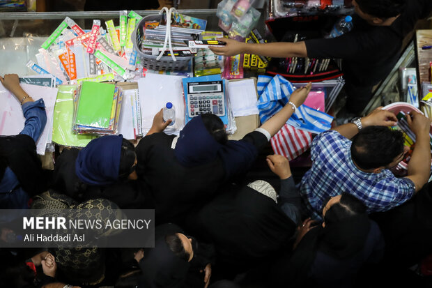 Busy market of stationery on eve of New School Year