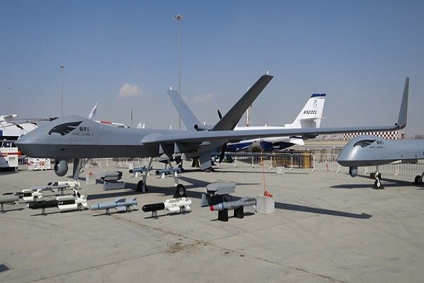 Chinese unveils drones capable of firing laser-guided bombs