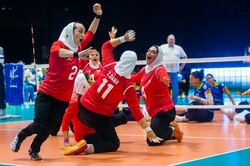 women sitting volleyball