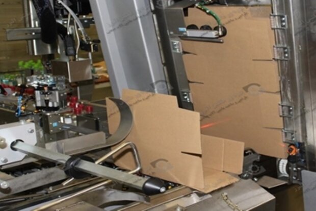 دستگاه کارتنینگ به کمک بسته بندی صنایع آمد