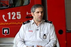 آتش سوزی یک دستگاه اتوبوس بی آر تی در خیابان ولیعصر تهران