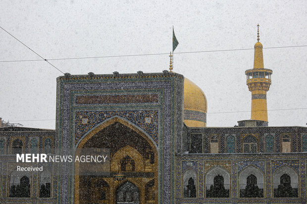 First autumn snow whitens Imam Reza Shrine in Mashhad
