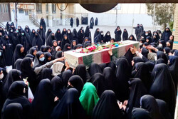 تشییع شهید گمنام بر دستان دختران دهه هشتادی مشهدی