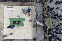 مراسم تشییع و خاکسپاری پیکر مطهر شهید گمنام در شهر درگهان 