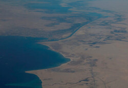 Cargo vessel runs aground in Suez Canal