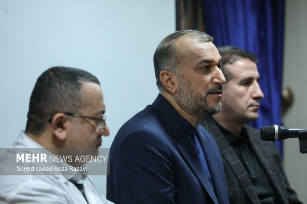 Mehr News Agency - FM visits inured Azeri staff in hospital