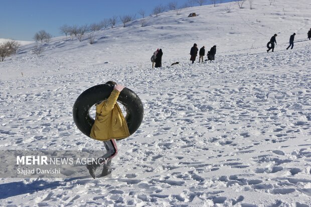 People enjoy snow sports in Lorestan province
