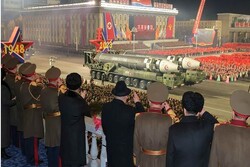 North Korea puts on biggest ICBM display in Jong-Un presence