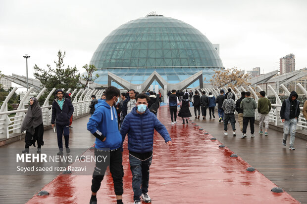 Tourists visit Nature Bridge in Tehran during Nowruz