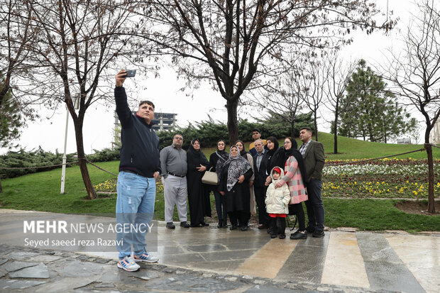 Tourists visit Nature Bridge in Tehran during Nowruz