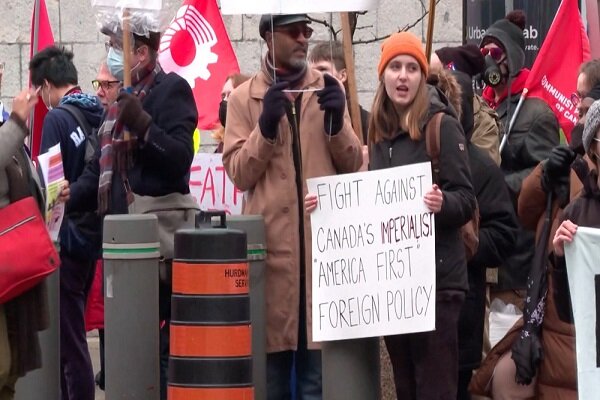 Canadians rally outside US embassy to protest Biden visit