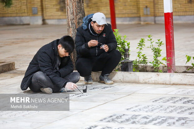 شستشو و رنگ آمیزی مجدد قبور شهدای قم