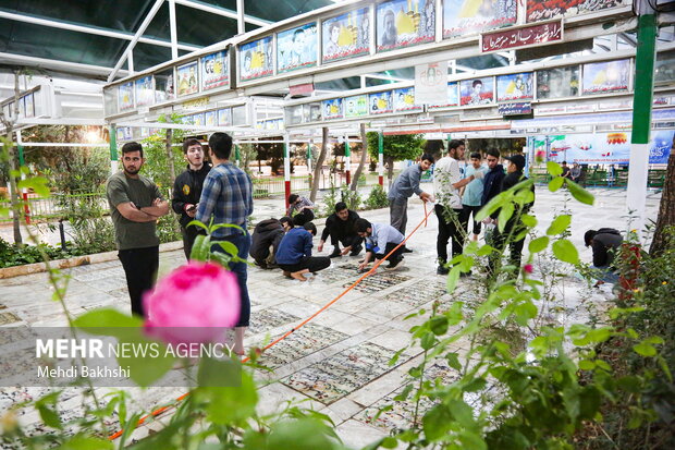 شستشو و رنگ آمیزی مجدد قبور شهدای قم