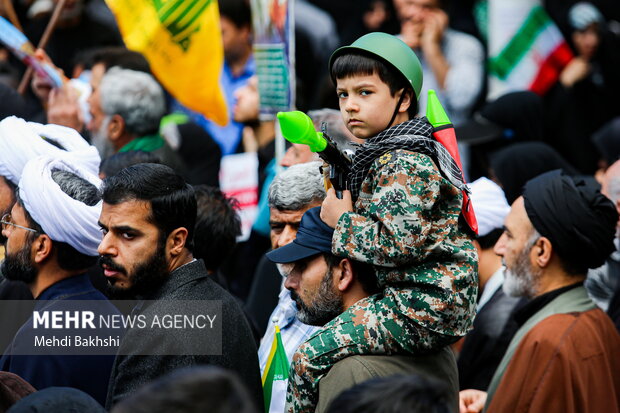 People in Qom mark Quds Day in solidarity with Palestinians