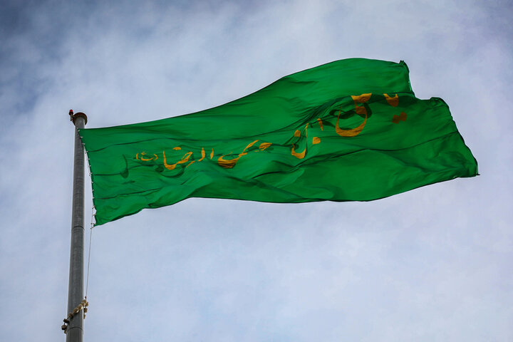 پرچم امام رضا (ع) در فردیس به اهتزاز درآمد