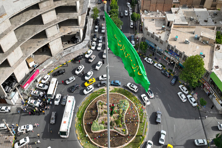 پرچم امام رضا (ع) در فردیس به اهتزاز درآمد