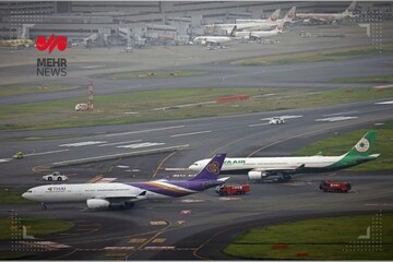 2 planes collide on ground at Tokyo airport, disrupt flights
