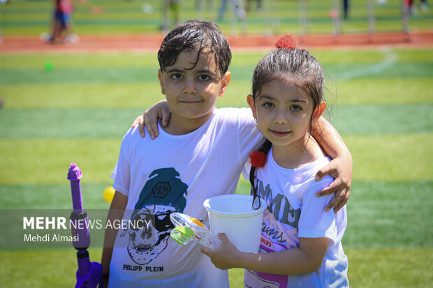 Children in Zanjan enjoy water play in Summer
