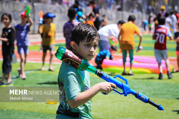 Children in Zanjan enjoy water play in Summer
