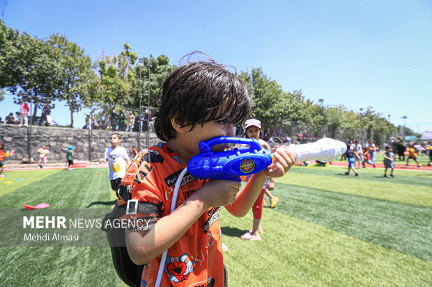 Children in Zanjan enjoy water play in Summer
